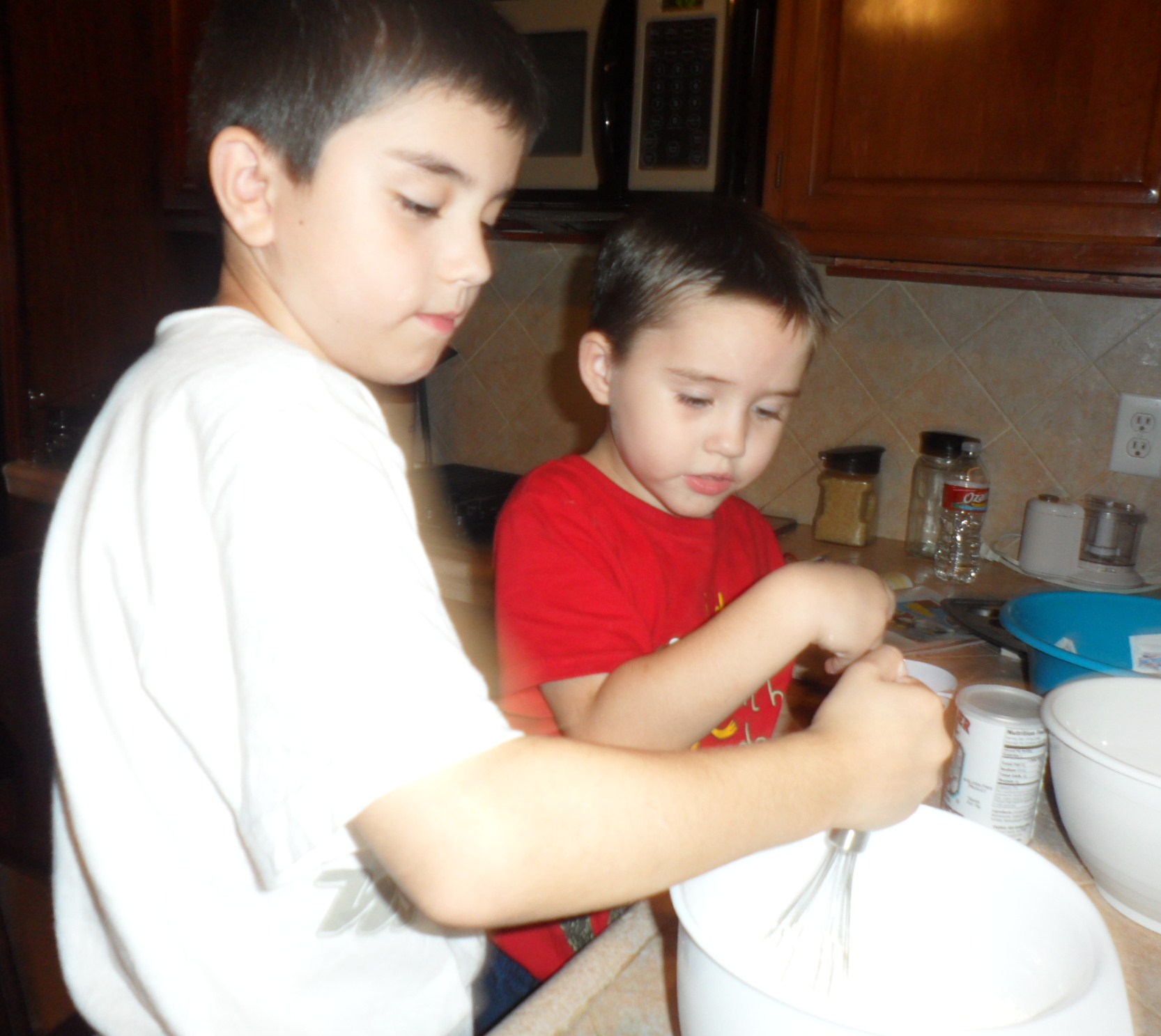 First the boys whisked together the dry ingredients...flour, baking powder, and salt.