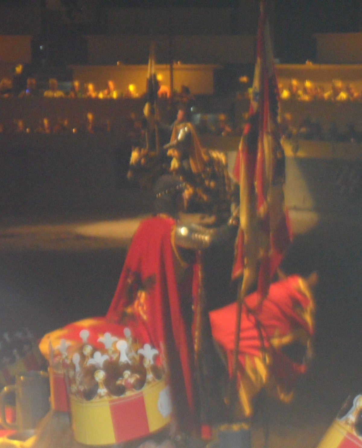 This was our knight...the Red & Yellow Knight.  In case you've never been there are several different sections and you are seated in one of them and that is the knight you cheer for.