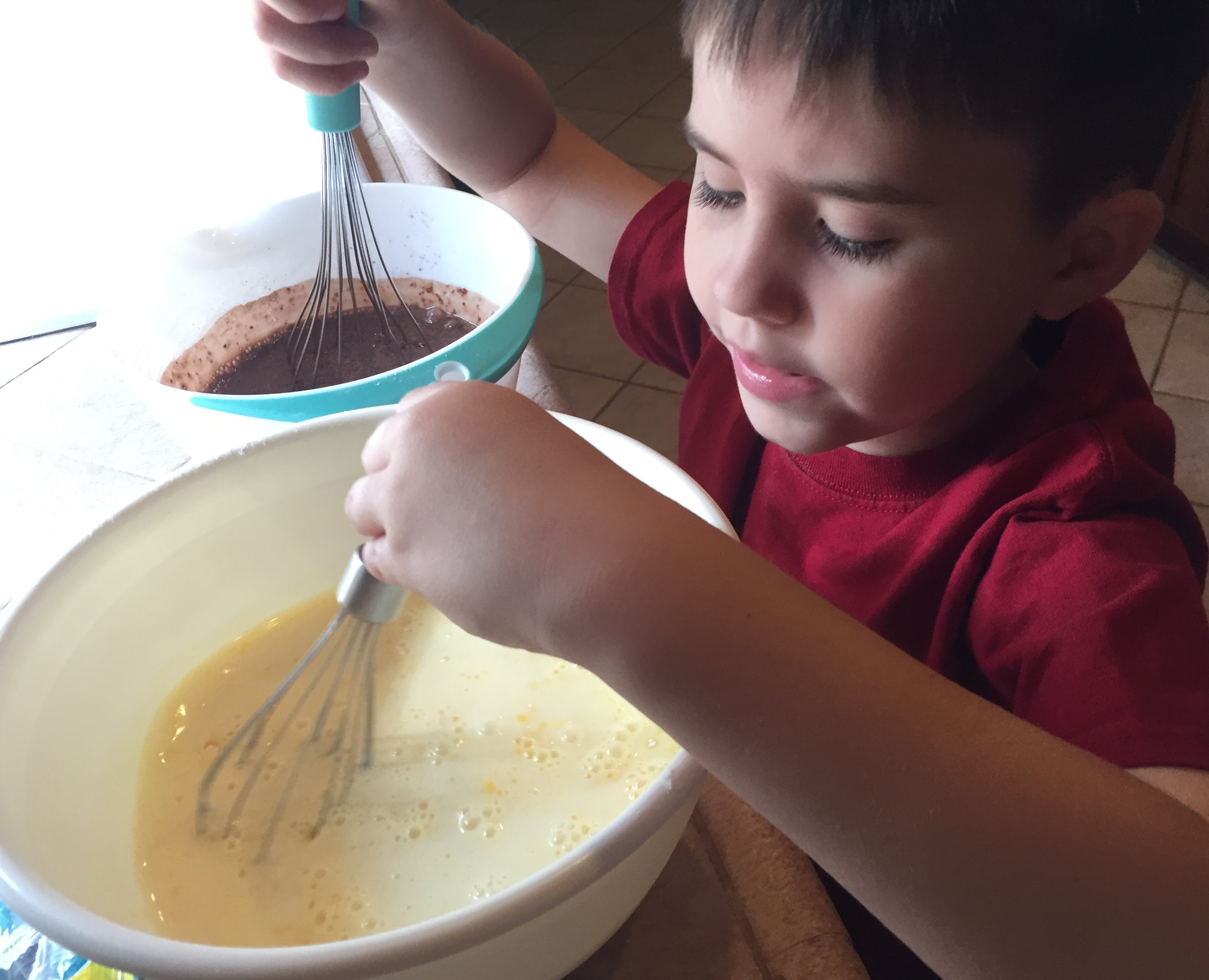 JT wanted to stir both puddings at the same time.
